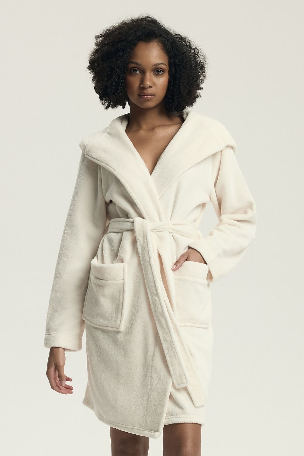 Luxurious women's hooded bathrobe by Henderson in warm soft material, perfect for cozy evenings.