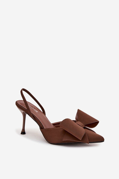 Stylish women's high heels with an open heel design by Step in Style, adorned with a beautiful bow detail, offering a luxurious touch to any outfit.