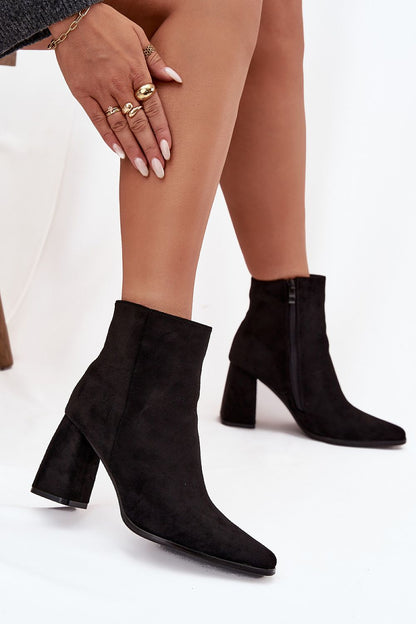 Close-up view of luxurious Step in Style eco suede ankle boots for women, showcasing the smooth texture and sophisticated design, ideal for chic winter looks.