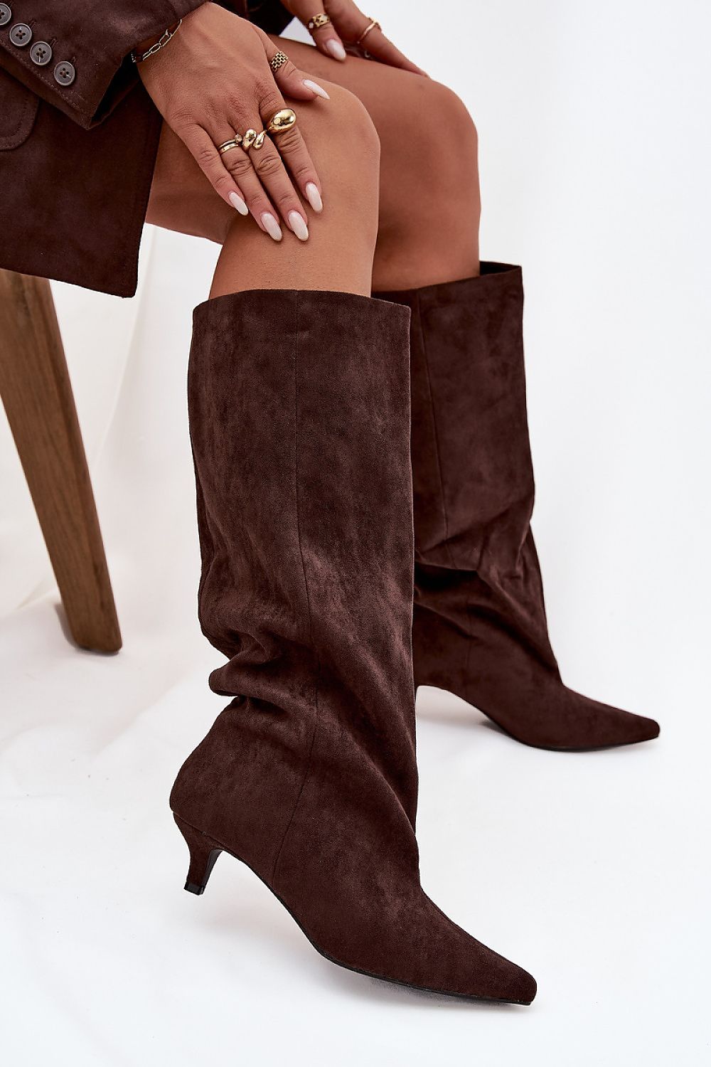 Luxurious faux suede heel boots for women by Step in Style, designed with a loose upper and flattering stitching, ideal for both casual and elegant occasions.