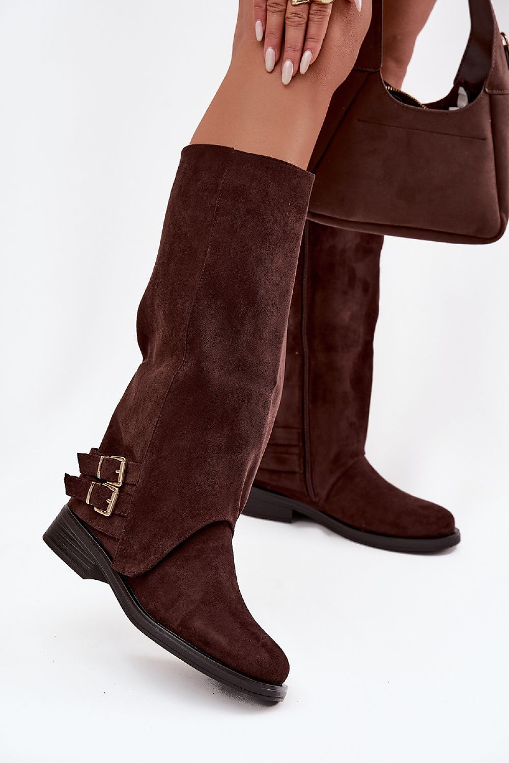 Elegant eco suede thigh-high boots by Step in Style featuring a flat heel and decorative straps, perfect for stylish and sustainable fashion.