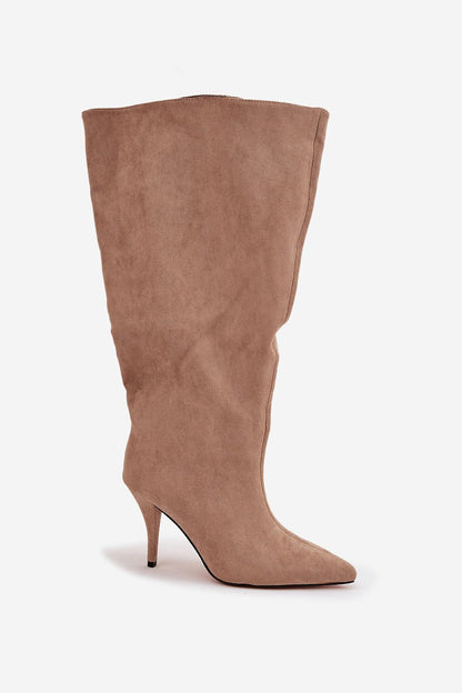 Close-up of elegant stiletto heel boots for women by Step in Style, featuring a pointed toe and loose shaft, made from eco suede for a refined look.