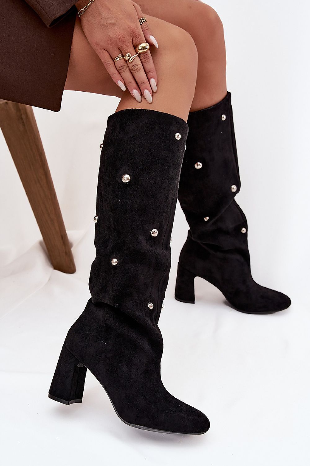 Luxury women's eco suede knee-high boots by Step in Style featuring 8 cm pillar heels, ideal for autumn-winter fashion. The elegant design with rounded toes and unique decorative details ensures comfort and warmth, available in sizes EU 36 to 41.