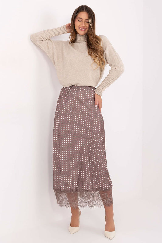 Elegant Rue Paris midi skirt featuring a delicate lace hem and stylish polka dot pattern, size EU 0, perfect for a sophisticated look.