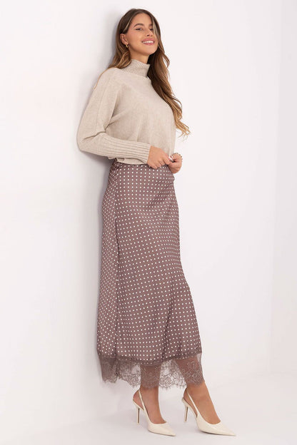 Luxurious polyester midi skirt with lace trim from Rue Paris, showcasing a fashionable polka dot design, ideal for various occasions.