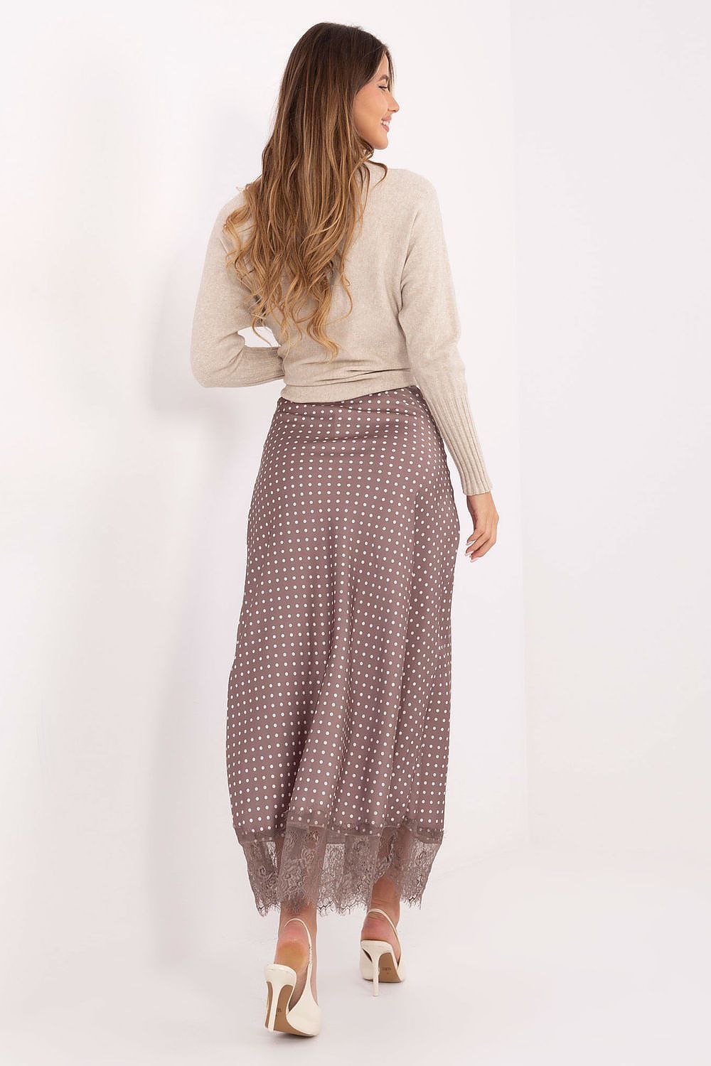 Elegant midi skirt by Rue Paris featuring delicate lace hem and chic polka dot pattern, perfect for sophisticated occasions.