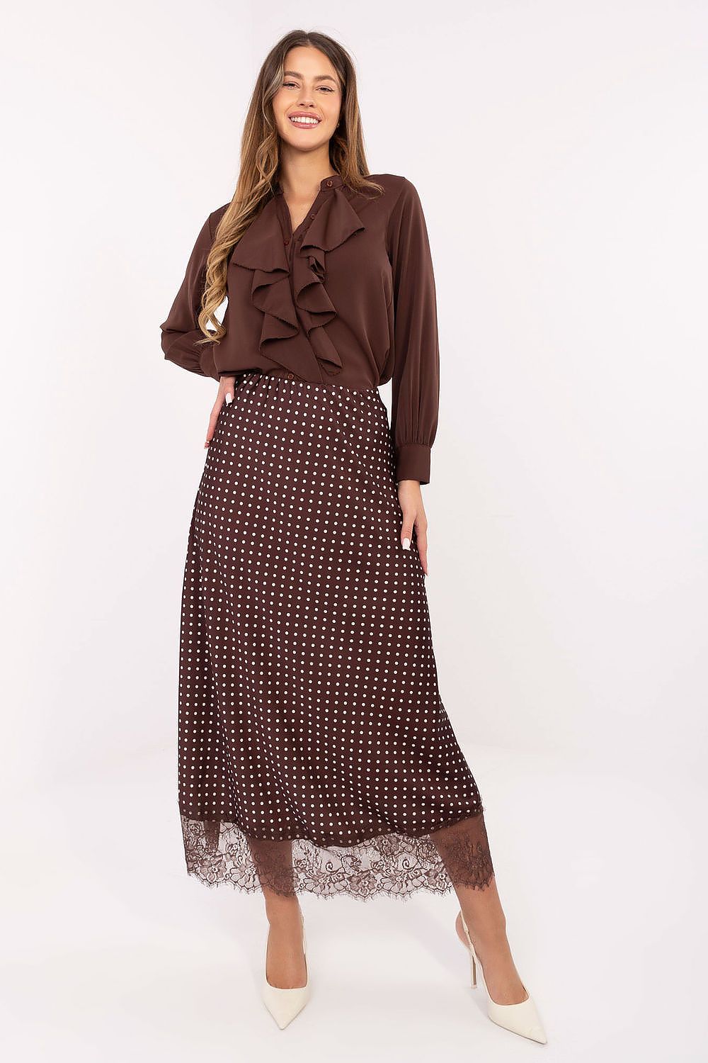 Elegant Rue Paris midi skirt featuring a charming polka dot pattern and delicate lace trim, perfect for sophisticated women looking to elevate their wardrobe.