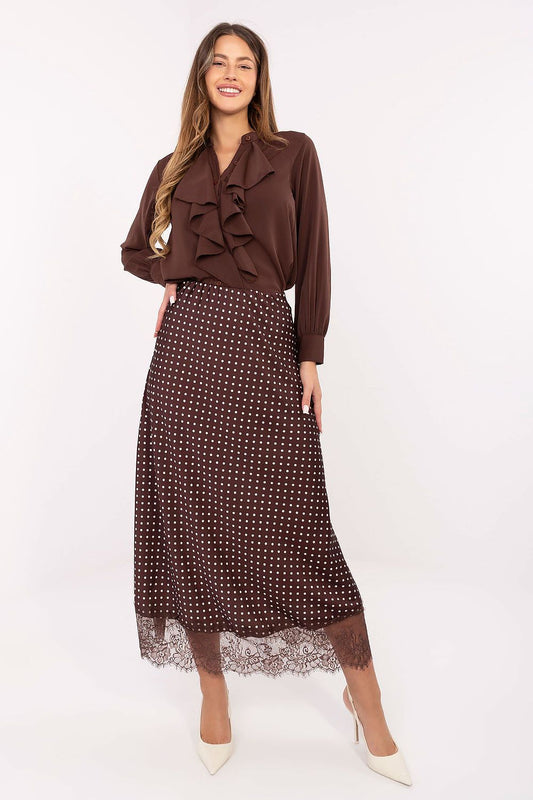 Elegant Rue Paris midi skirt featuring a charming polka dot pattern and delicate lace trim, perfect for sophisticated women looking to elevate their wardrobe.