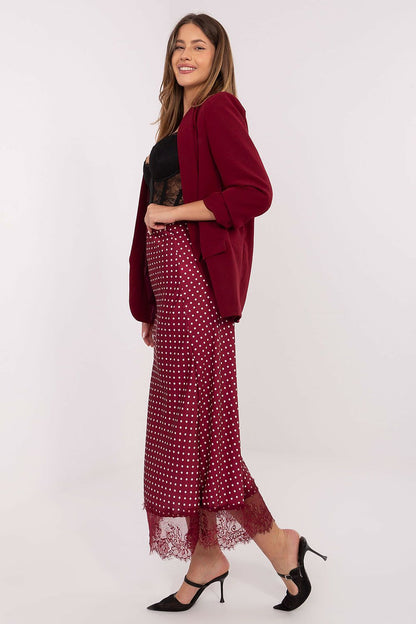 Rue Paris elegant midi skirt showcasing delicate lace detail and playful polka dot pattern, perfect for luxurious casual or formal occasions.