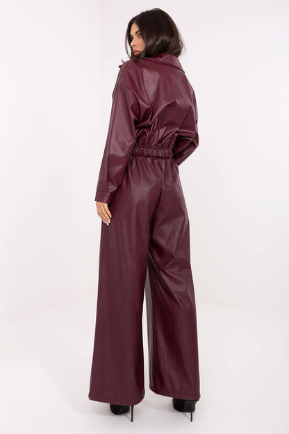 Model wearing Rue Paris high-waisted palazzo pants, exemplifying chic casual style with side slip pockets and refined fit.