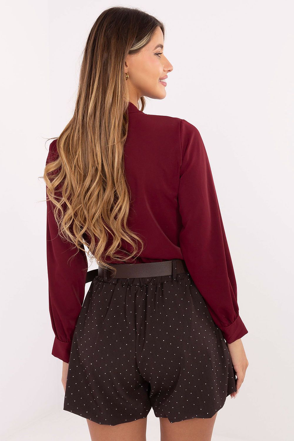 Full outfit display showcasing Rue Paris elegant high-waisted shorts with wide legs, styled for a formal occasion, epitomising sophistication and comfort.