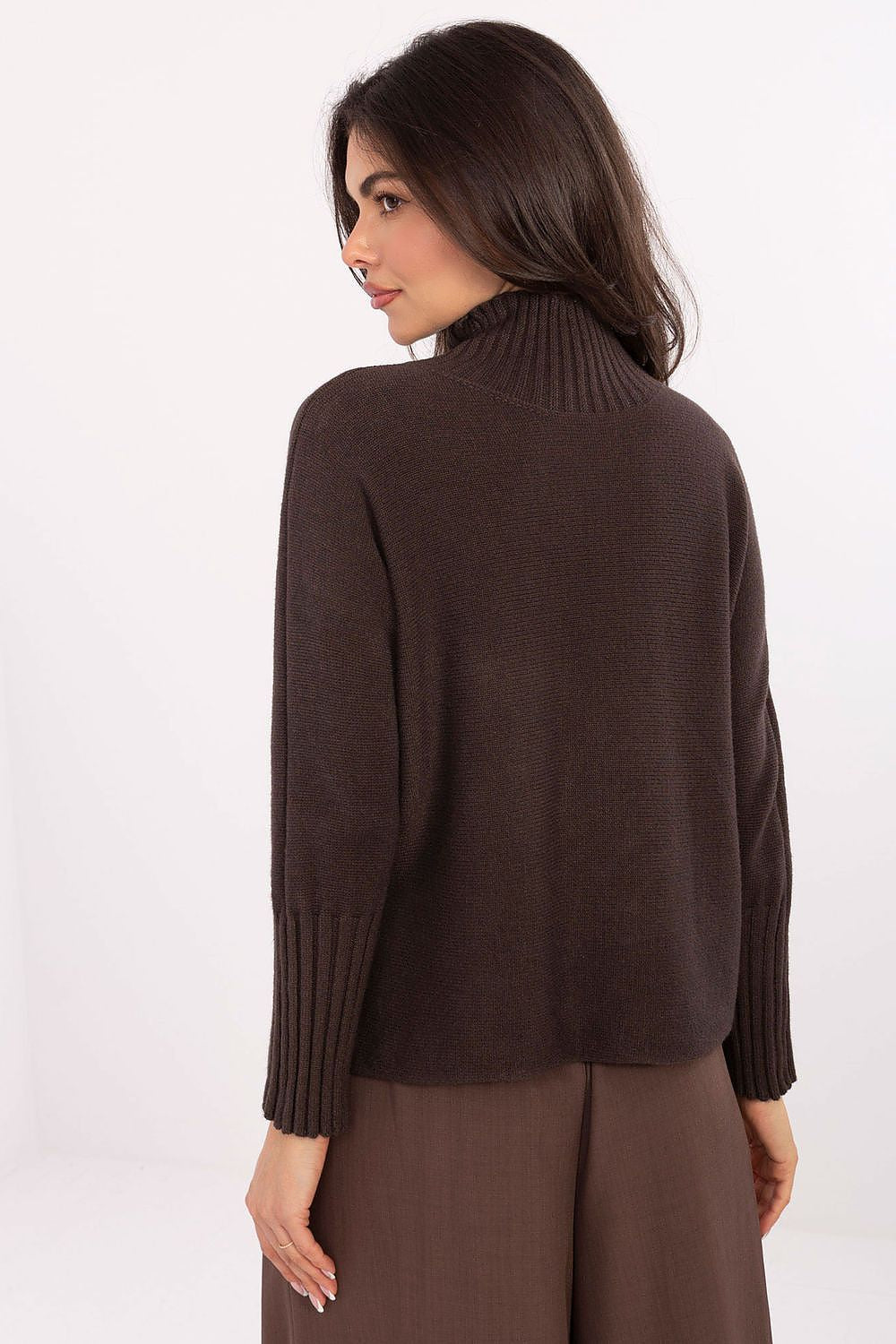 Rue Paris turtleneck sweater, featuring a versatile design perfect for both everyday wear and work, styled beautifully with pants and skirts.
