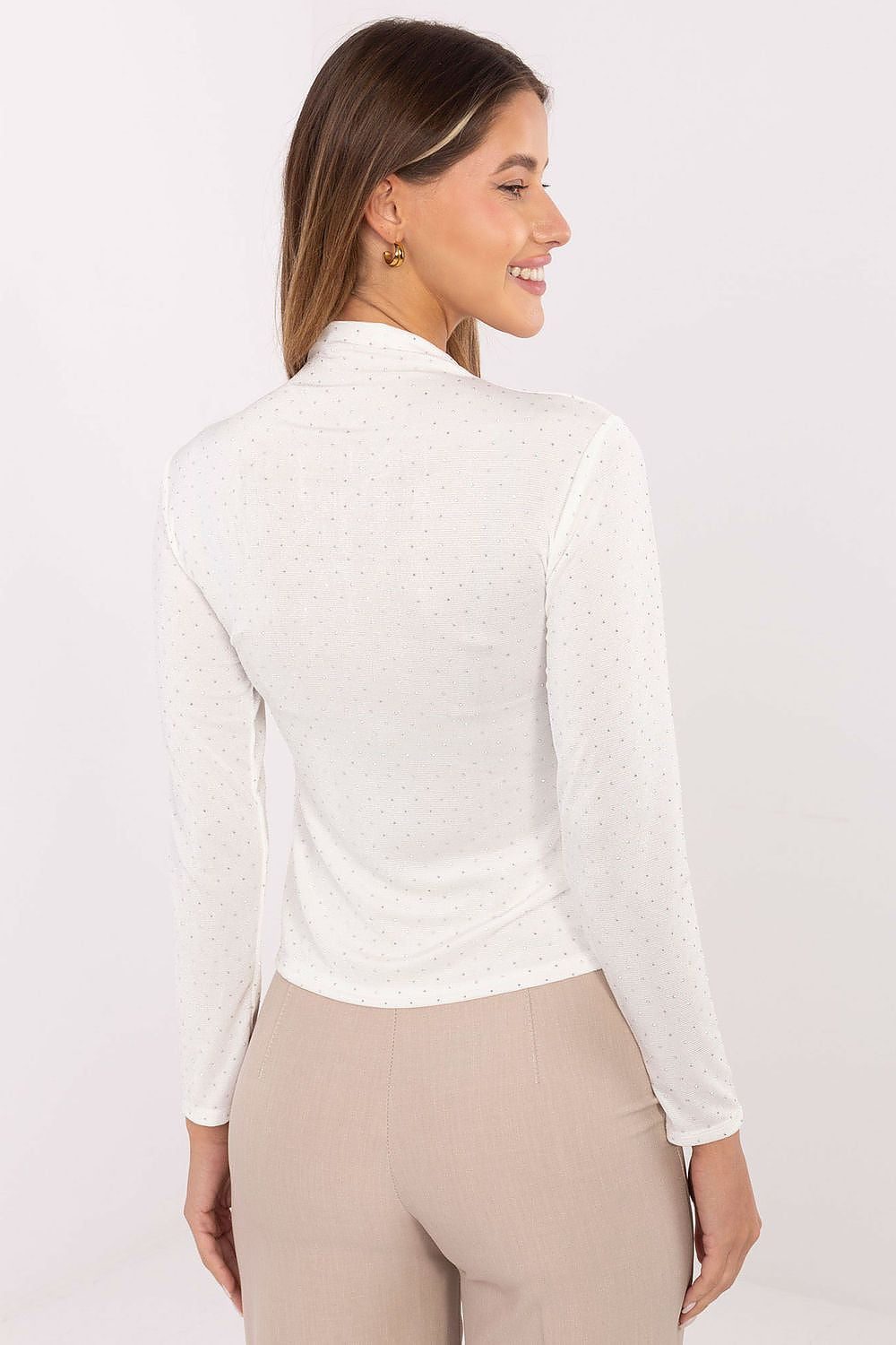 Stylish Rue Paris women's blouse displayed elegantly, emphasising its fitted style and versatility for chic outfits.