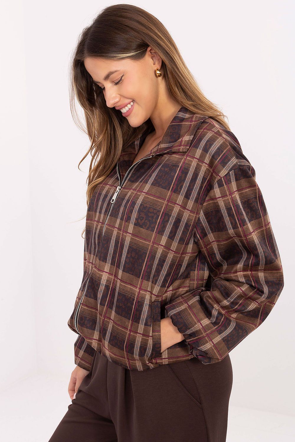 Close-up of the intricate animal print and check pattern on Rue Paris women's jacket, showcasing luxury and sophisticated design.