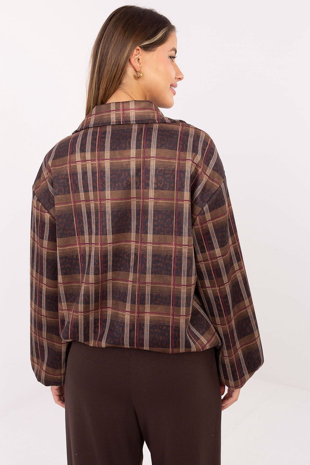 Chic lifestyle image of a woman wearing the Rue Paris casual jacket, epitomising trendy elegance and comfort for everyday outfits.