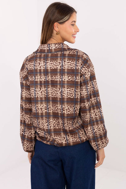 Luxurious stylish women’s jacket by Rue Paris featuring an elegant blending of animal print and check pattern, crafted from a high-quality polyester blend, ideal for a chic urban outfit.