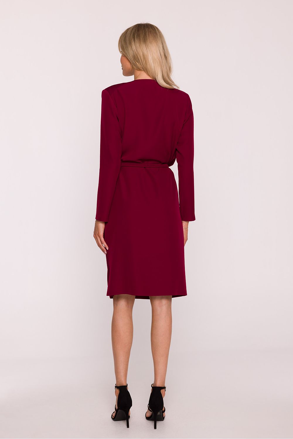 Stylove pencil dress displayed elegantly on a hanger, showcasing the beautiful design and craftsmanship tailored for modern women.