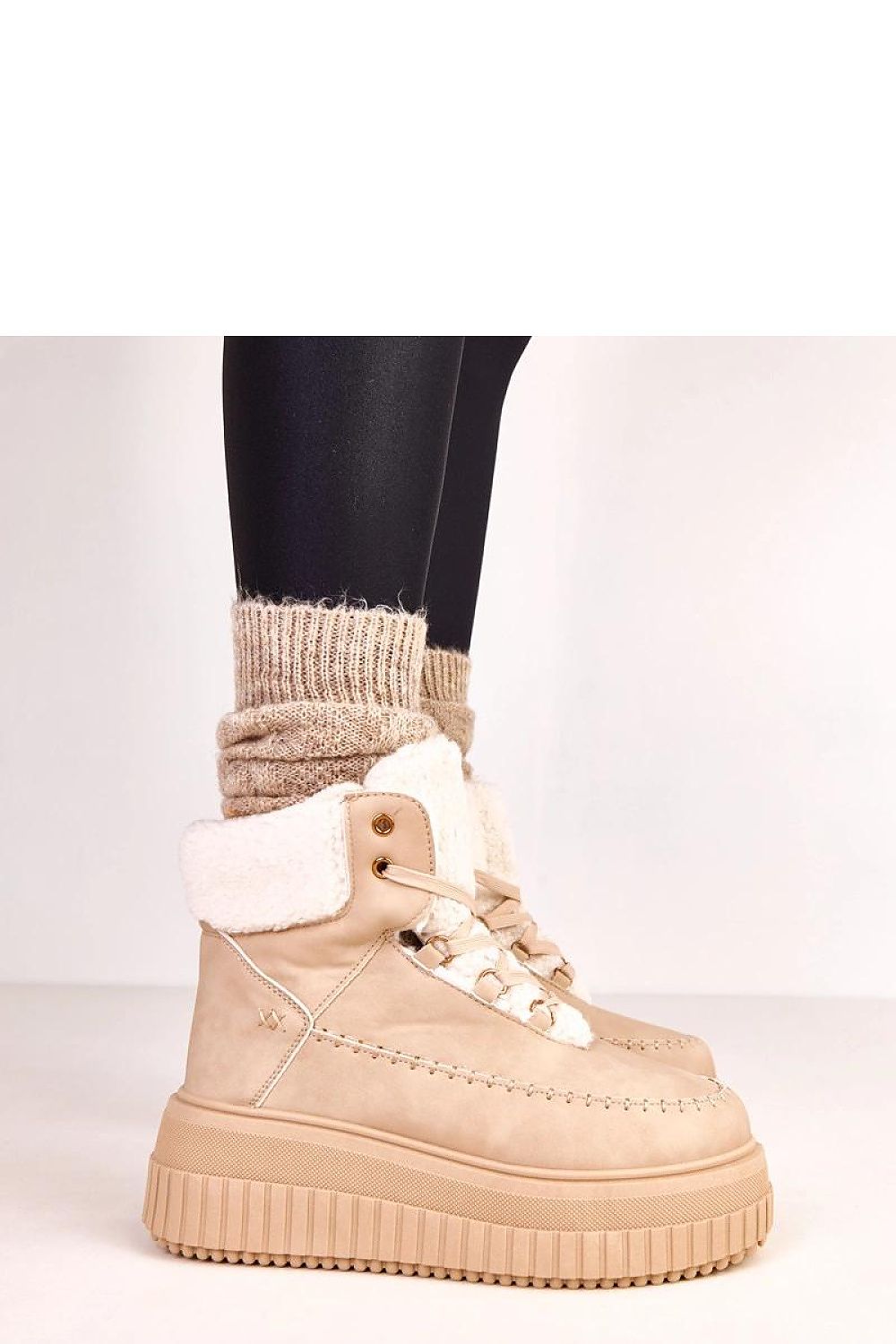 Solea stylish lace-up sports ankle boots featuring faux fur lining and a 6.5cm platform, perfect for urban casual fashion.