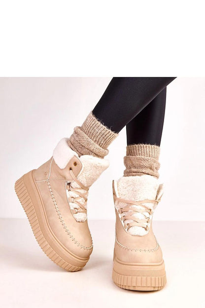 Elegant view of Solea's lace-up sports ankle boots with warm faux fur lining, designed for comfort and style with 12cm shaft height.