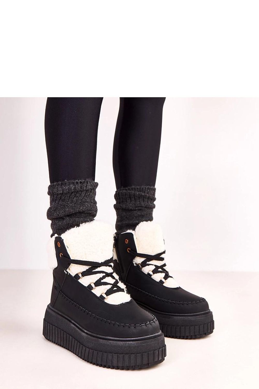 Solea Stylish Sport Ankle Boots featuring eco-leather, laces, and luxurious fur lining, perfect for urban fashion and comfort.