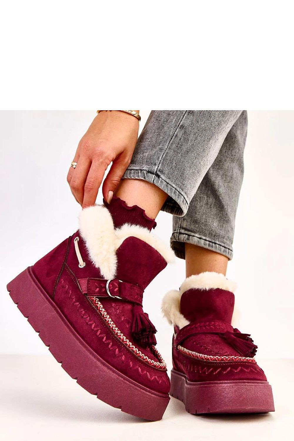 Close-up of Solea Women's eco-friendly suede leather snow boots with soft fur interior, designed for supreme warmth and comfort in winter.