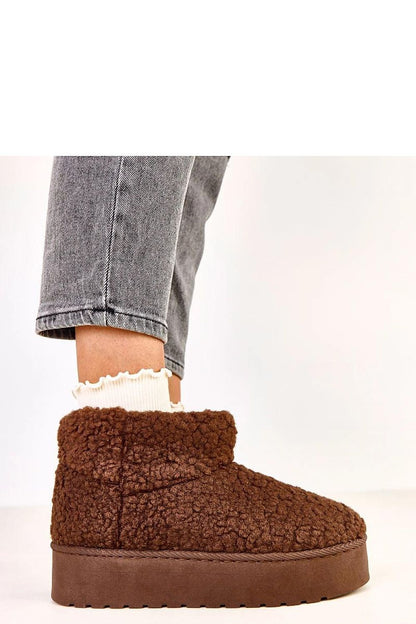 Solea luxury slip-on snow boots featuring plush synthetic fur for unparalleled warmth and comfort, ideal for winter.