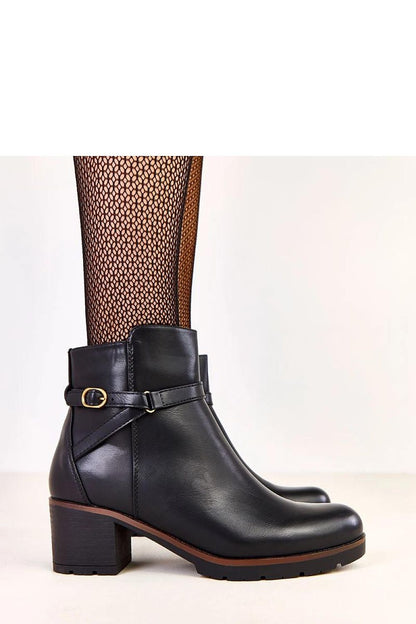 Close-up of the luxurious Solea ankle boots with a chic decorative strap and round toe, designed for comfort and sophistication.