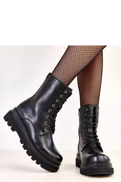 Solea insulated laced booties featuring a luxurious design with a side zipper closure, crafted from ecological leather, providing elegance and functionality for cooler days.