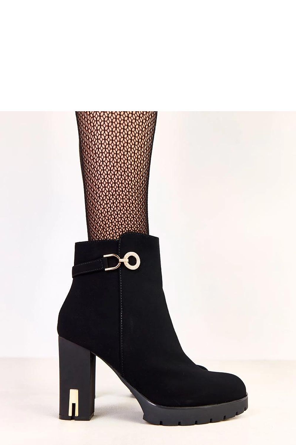 Solea Ankle Boots showcasing a chic silhouette with a 12.5 cm upper, round toe design, and luxurious materials for a sophisticated look.