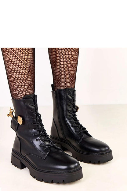 Elegant stylish women's ankle boots by Solea featuring a side zipper, 5 cm heel, and a decorative gold teddy bear charm.