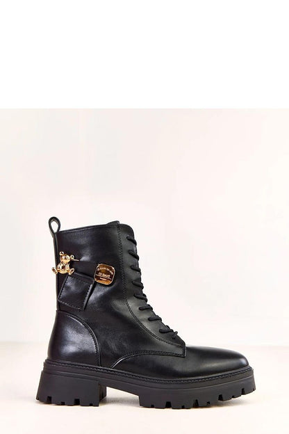 Fashionable women's ankle boots by Solea, exhibiting a unique teddy bear charm and stable 5 cm heel for effortless elegance.