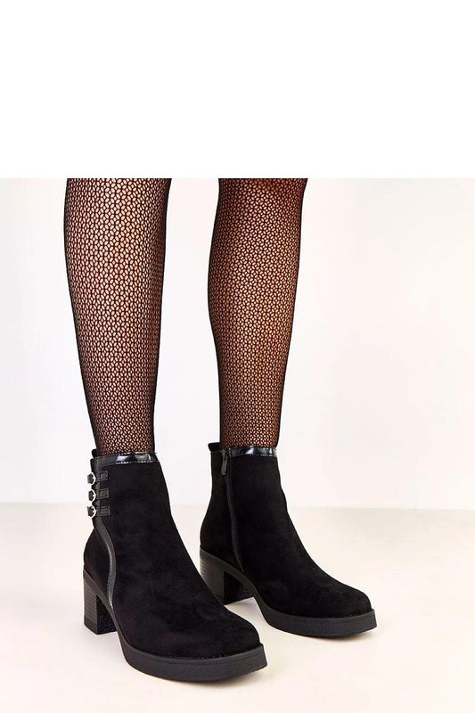 Elegant Solea women's ankle boots in eco suede leather, featuring a 7 cm heel and stylish design, ideal for modern urban fashion.