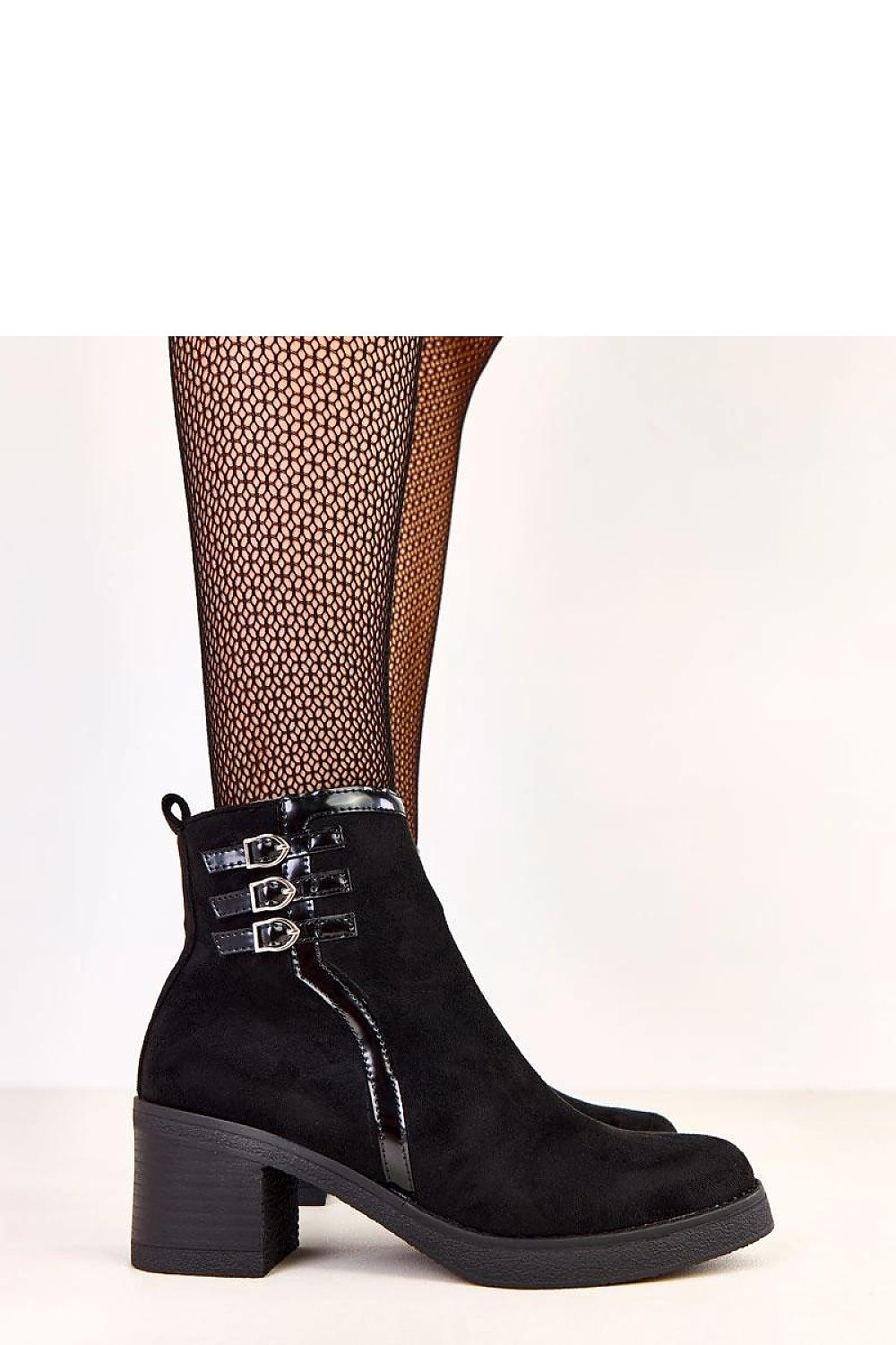 Solea elegant women's ankle boots in eco suede leather with a 7cm heel, showcasing their stylish design and grace.