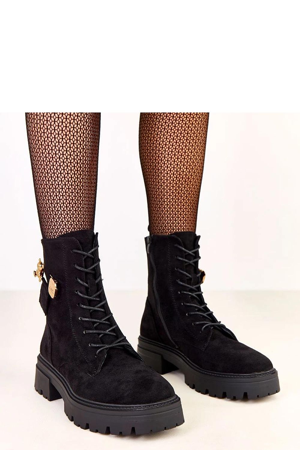 Elegant women's work boots by Solea in suede-like eco leather, featuring a 5.5 cm heel and insulated comfort, perfect for stylish professional wear.