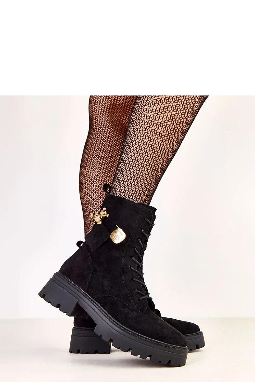 Close-up of Solea's chic suede-like eco leather work boots with decorative gold teddy bear charm and practical side zipper for stylish functionality.