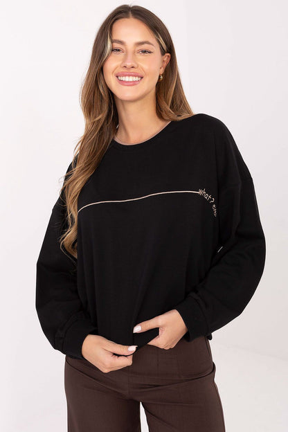 Elegant oversized women's sweatshirt by Relevance featuring contrasting shoulder inserts, perfect for modern casual styles.