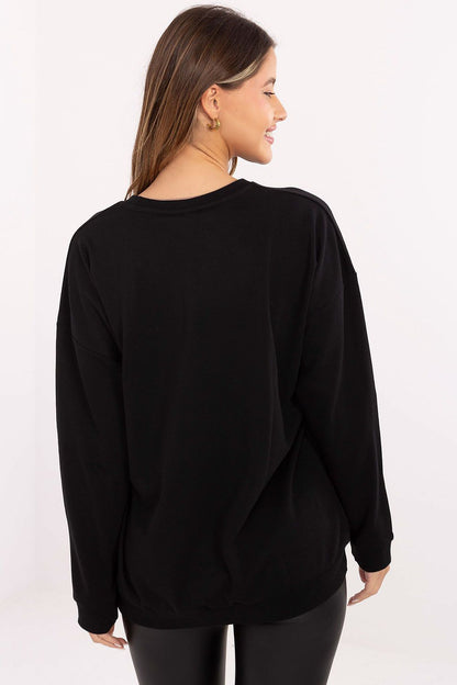 Relevance's sophisticated oversized women's sweatshirt with braided design, made from a soft cotton-polyester blend, perfect for layering on cooler days.