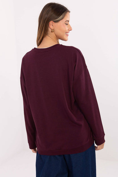 Luxurious oversized women's sweatshirt by Relevance featuring a 70% cotton blend, stylish braided detail, and a relaxed fit, perfect for chic casual wear.