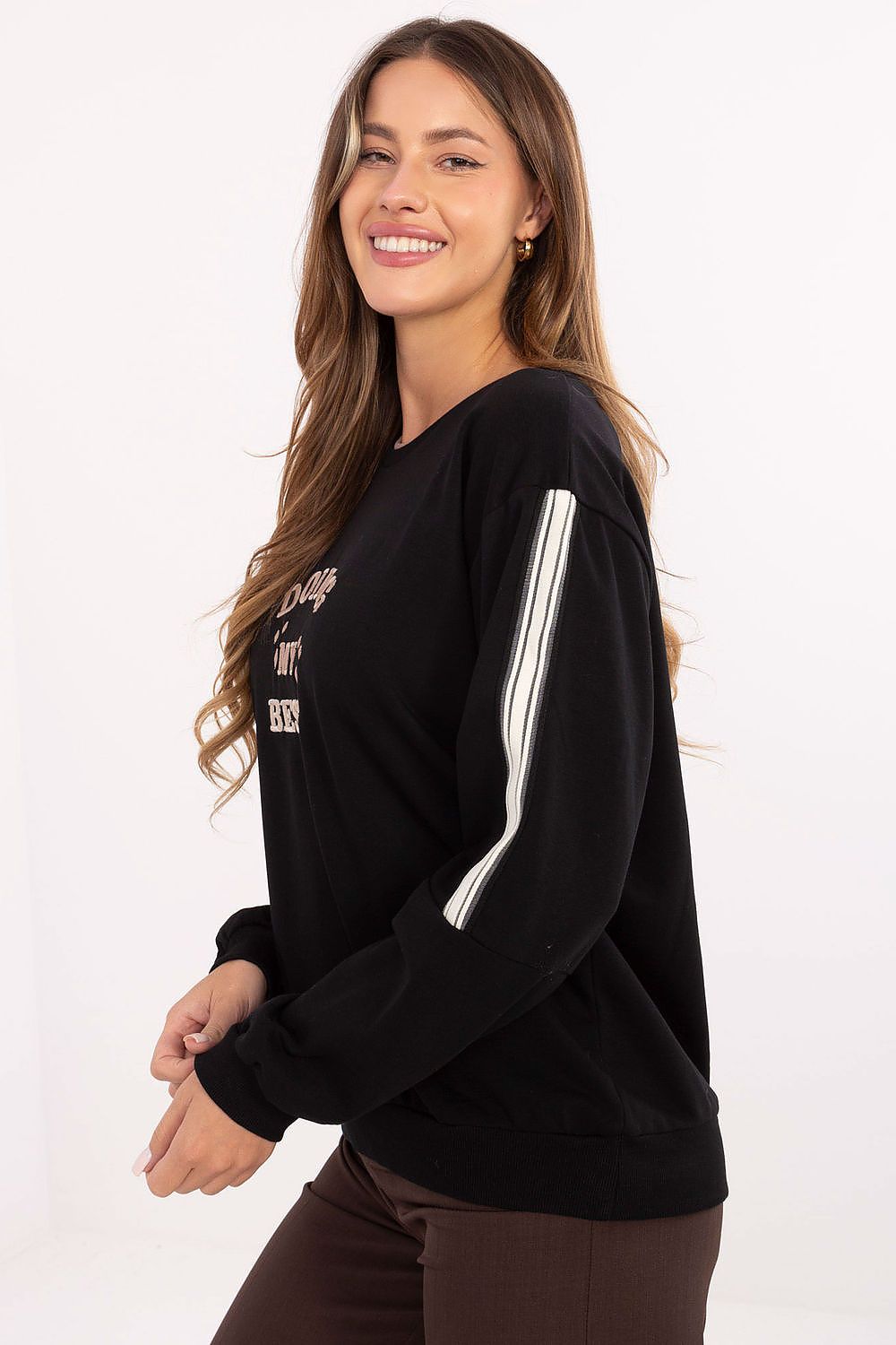 Stylish oversized women's sweatshirt featuring sporty stripes on sleeves by Relevance, perfect for urban fashion enthusiasts.