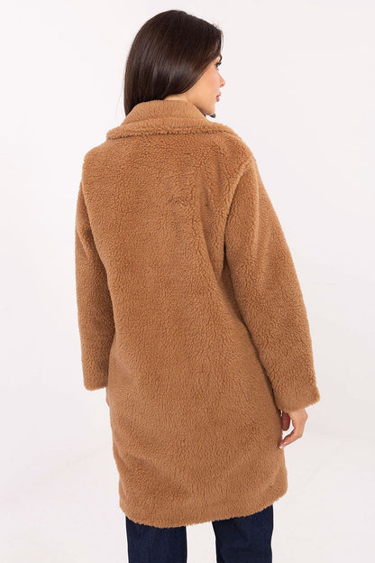 Luxurious single-breasted button closure of the women's coat in artificial lamb by Factory Price, highlighting its sophisticated urban elegance.