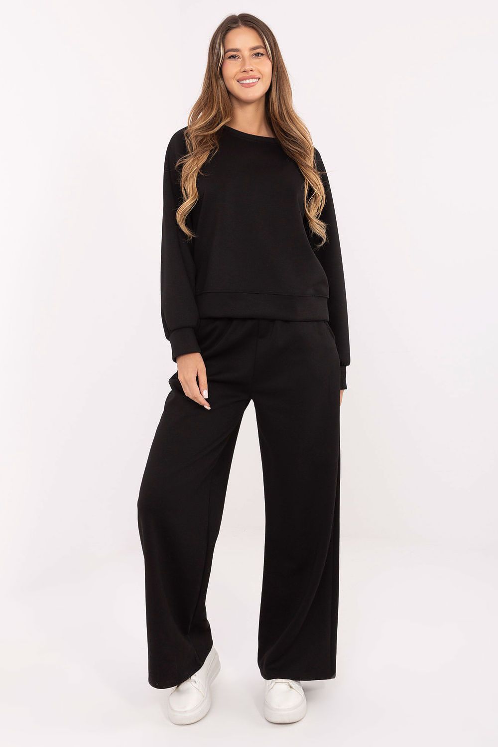 Complete luxury women's tracksuit look styled by Factory Price, showcasing casual elegance perfect for both home and city outings.