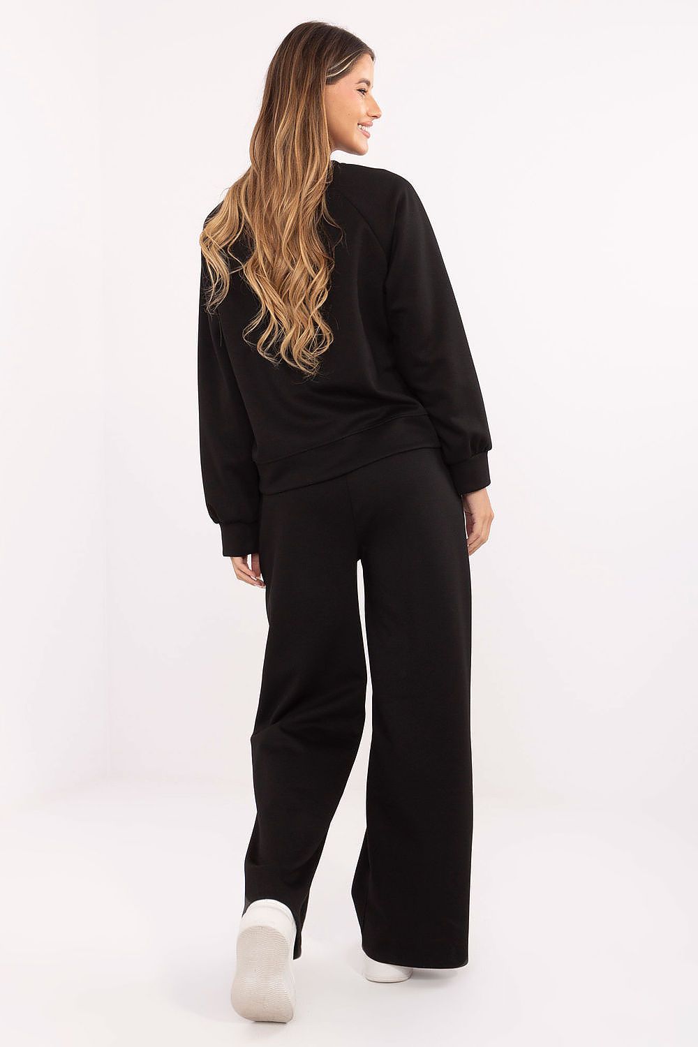 Elegant blouse from the luxury women's tracksuit set by Factory Price, designed with casual cut in delicate butter-like material.