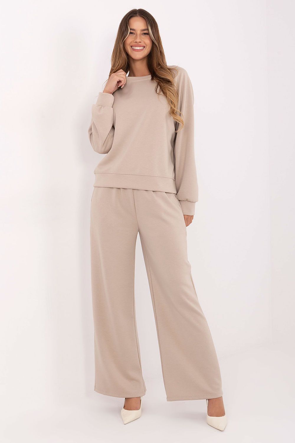 High-waisted pants of the luxury women's tracksuit set by Factory Price, crafted with flexible butter-like fabric for ultimate comfort.