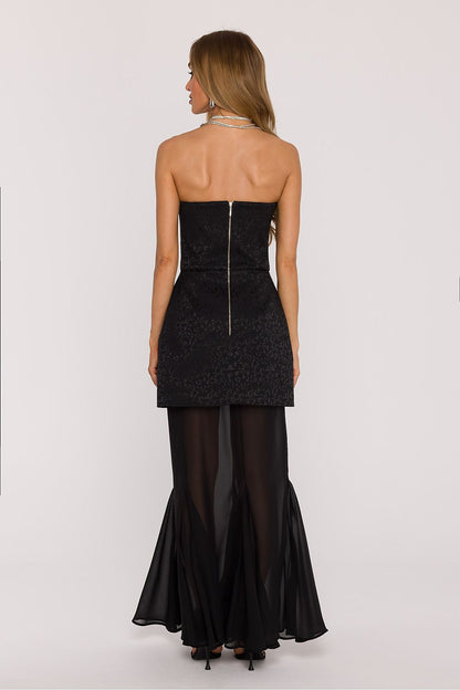 Back view of Moe's elegant evening dress, highlighting the covered zipper closure and the fitted waist for a sophisticated silhouette.