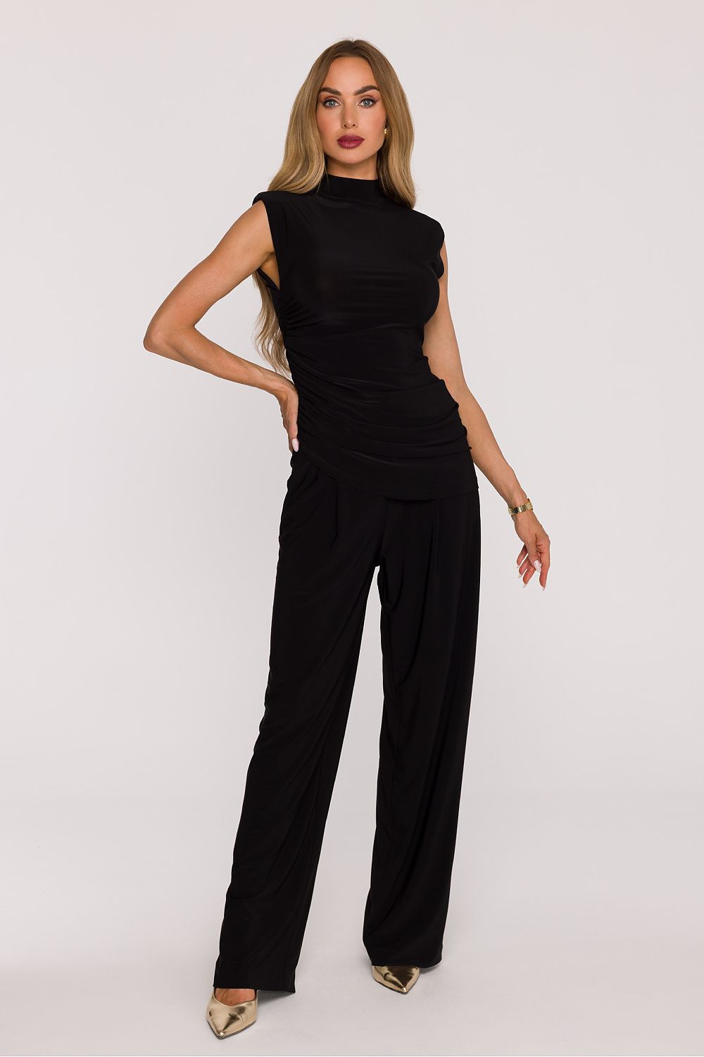 Wide-leg pants from Moe's Modern Women's 2-Piece Knit Set, showcasing a loose fit and functional side pockets for effortless elegance.