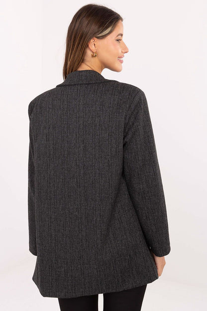 Close-up of Italy Moda luxury women's blazer jacket details, featuring notched lapels, decorative brooch, and high-quality fabric blend for a timeless fashion statement.