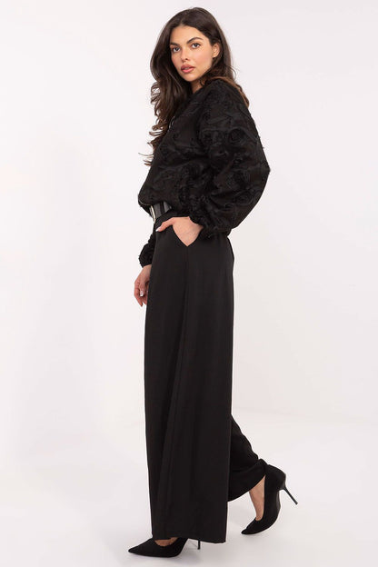 High-quality palazzo pants by Italy Moda showcasing a refined character with smooth material and wide legs, designed for both casual and formal occasions.