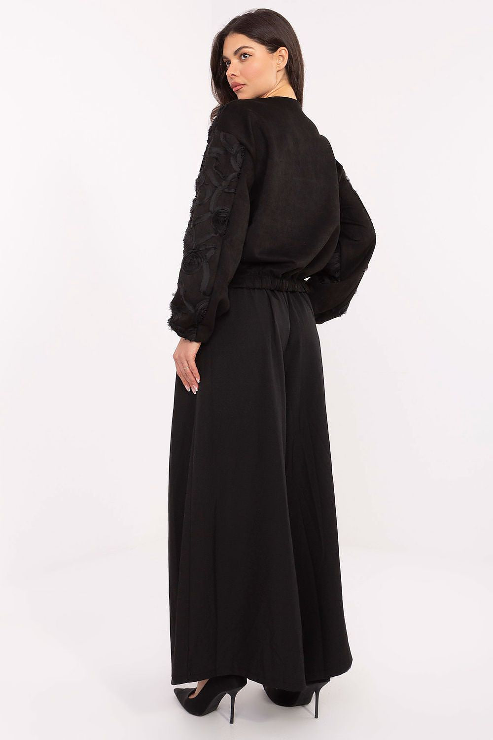 Chic Italy Moda women's palazzo pants, perfectly fitted with an elastic waistband and adjustable belt, perfect for elegant styling in any wardrobe.