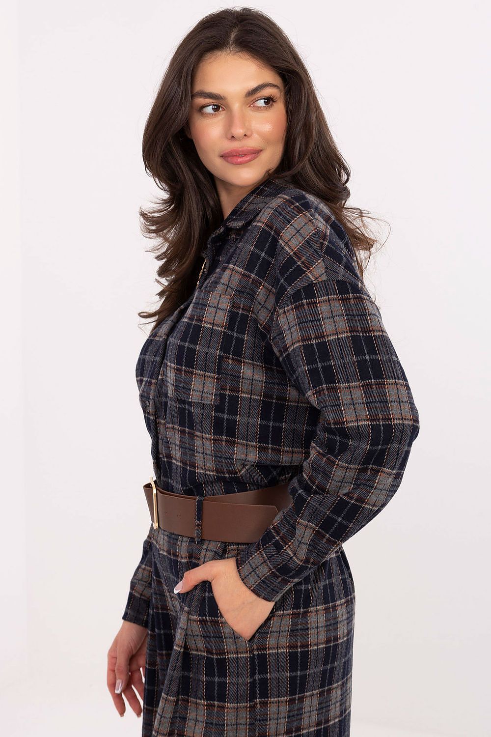 Close-up of Italy Moda's luxurious women's flannel shirt with long sleeves, classic collar, and fashionable checkered pattern, showcasing the chic pocket and detachable brooch for an elegant touch.
