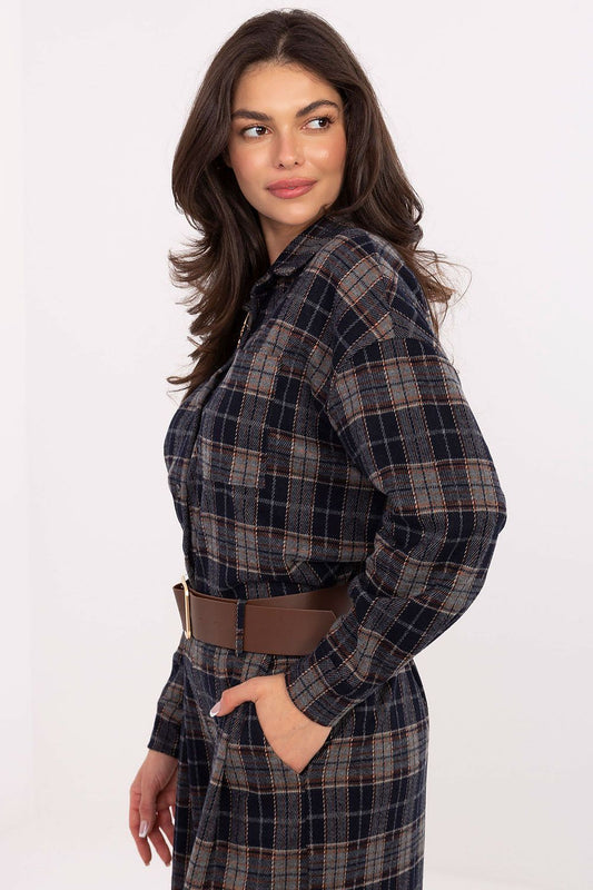 Close-up of Italy Moda's luxurious women's flannel shirt with long sleeves, classic collar, and fashionable checkered pattern, showcasing the chic pocket and detachable brooch for an elegant touch.